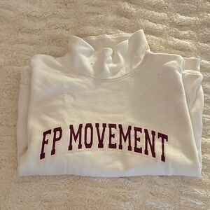 FP Movement by Free People White Sweatshirt with Maroon Lettering